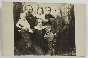 RPPC Lovely Family Photo Cute Children Lovely Clothing Wooded Scene Postcard R5