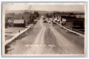 Newcastle Wyoming WY Postcard RPPC Photo Main Street Cars Stores Scene c1940's