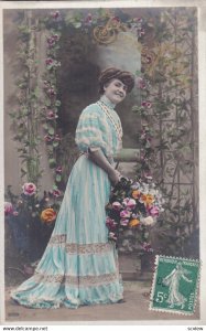 RP; BIRTHDAY, 1900-10s; Bonne Fete, Woman wearing blue gown holding flower ba...