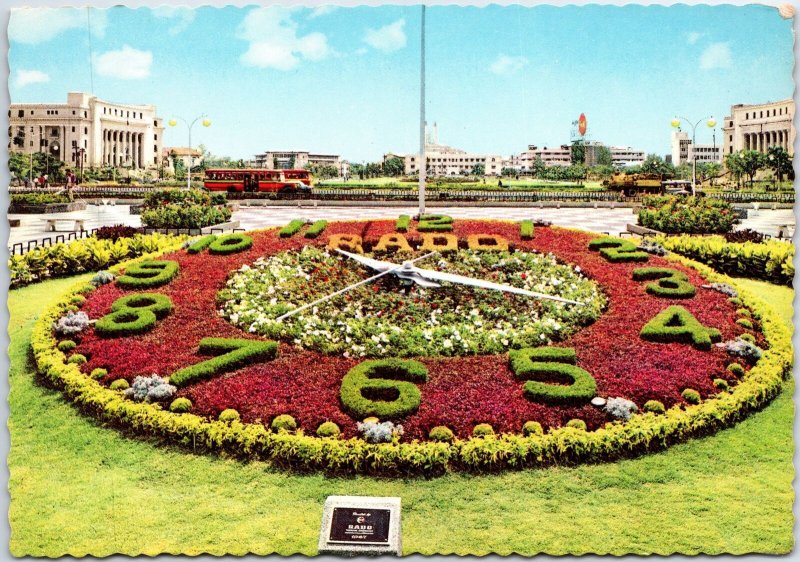 VINTAGE CONTINENTAL SIZE POSTCARD THE RADO FLOWER CLOCK RIZAL MANILA PHILLIPINES