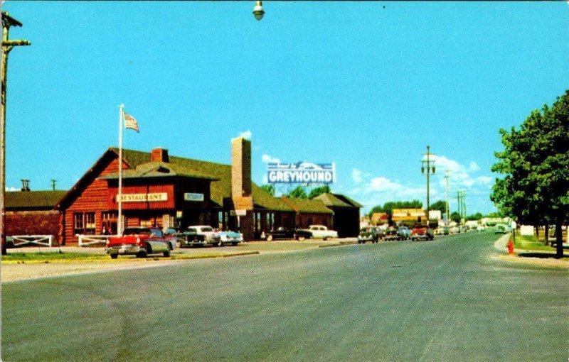 Mackinaw City, MI Michigan  HURON STREET SCENE Greyhound Bus Station  Postcard