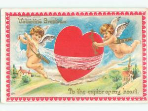 Pre-Linen valentine CUPIDS FLYING WITH LARGE HEART J0635