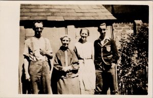 Portrait of Four People Family Men Women RPPC by Jerome Ltd Postcard F63