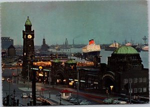 Postcard  Germany Hamburg St. Pauli Landing Stage at dusk clock tower ships