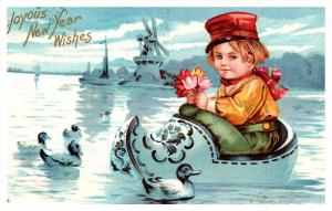 New Year , Dutch boy floating in shoe