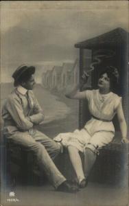 Romance Bathing Beauty Smoking Cigarette & Flirting w/ Man c1910 RPPC