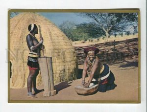 470835 South Africa Zulu semi-nude women grinding mealies Germany corn stamp