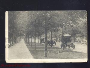 KANSAS CITY MISSOURI ARMOUR BLVD. STREET SCENE ANTIQUE CARS VINTAGE POSTCARD MO