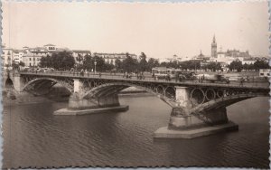 Spain Sevilla Rio Guadalquivir y Puente Isabel II Seville Vintage RPPC C050