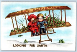 Christmas Postcard Children Binocular Riding Airplane Looking For Santa Embossed