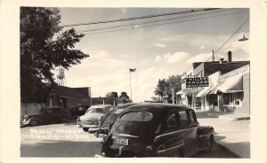 H57/ Leeds North Dakota RPPC Postcard c1940s Main St Miller Drug Store 80