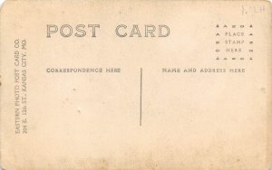Kansas City Missouri 1910s RPPC Real Photo Postcard Man Holding Newspaper