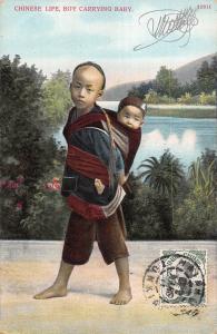 BR94863 life boy carrying baby child types folklore costumes china hong kong TCV