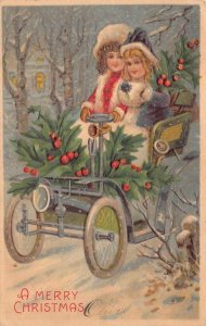 CHRISTMAS HOLIDAY CHILDREN CAR EMBOSSED POSTCARD 1907