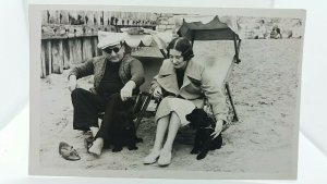 Vintage Postcard London Couple On Beach With Their Dogs 1950s Real Photo Delboy?