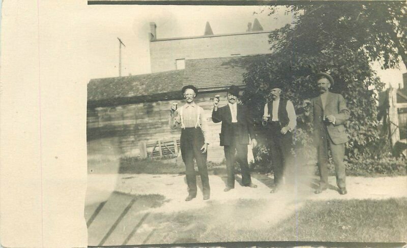 C-1910 Men Beer Glass Toast Hats Suits RPPC Photo Postcard 20-4771