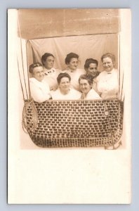 RPPC GROUP OF WOMEN BALLOON DIRIGIBLE STUDIO REAL PHOTO POSTCARD (c.1910)