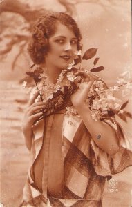 Pretty lady. Carrying flowers  Old vintage French photo postcard 1920s