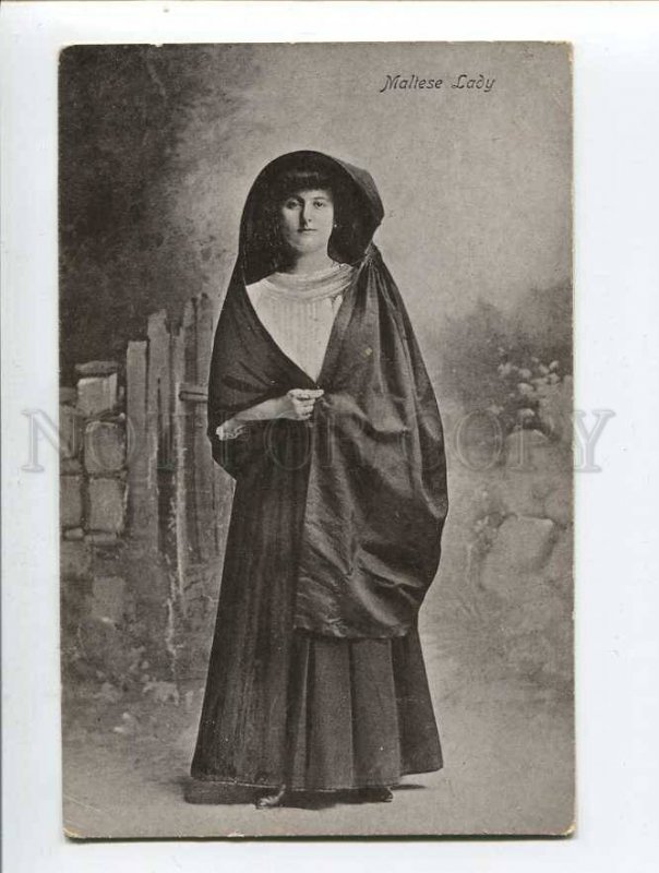 287233 MALTA Lady in native dress Vintage postcard