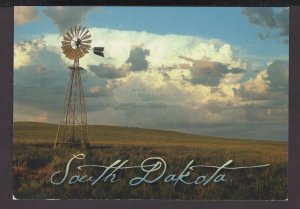 South Dakota A lone windmill stands as a reminder of simple times. - Cont'l