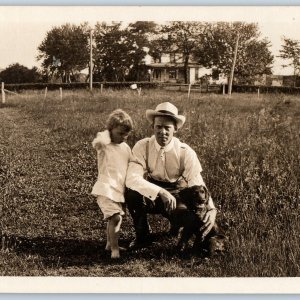 c1910s Lovely Father & Son Cute Small Dog RPPC Farm House Fence Real Photo A193