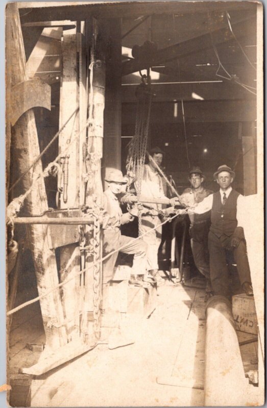 Real Photo Postcard Men Working in Mine Shaft or Oil Rig