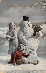 Children building a snowman Snow Man 1915 