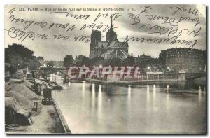 Old Postcard Paris Vye taken at night on the Seine and Notre Dame