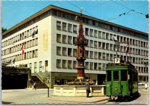 VINTAGE POSTCARD CONTINENTAL SIZE TRAM SCENE AT FISH MARKET IN BASEL SWITZERLAND