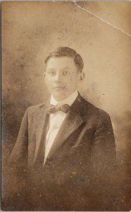 Portrait of Young Man with Bow Tie RPPC Postcard F63 *as is