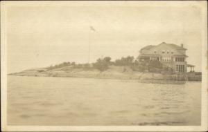 Home & American Flag Looks Like Coastal RI Newport? or Narragansett? RPPC