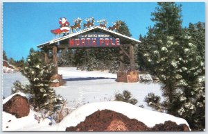 Santa's Workshop North Pole Colorado Winter Entrance Gate Postcard