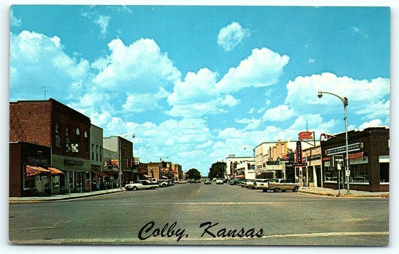 Postcard KS Colby 1950's Franklin Avenue Street View Old Cars Ford Dealer A23