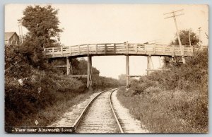 Ainsworth Iowa~Railroad Tracks Under Wooden Truss Bridge~Horse Buggy~c1908 RPPC 