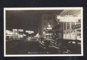 RPPC EUGENE OREGON DOWNTOWN STREET SCENE NIGHT OLD CARS REAL PHOTO POSTCARD