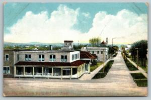 Red Oak Iowa~Main Street North from Depot~Hotel? Wrap Around Porch~Stores~1909