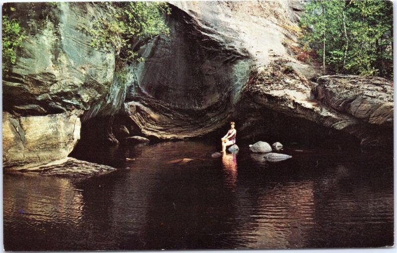 Oyster Shell, Artists Gorge, Pottersville, New York - Woman sitting on rock 