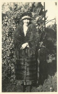 Well Dressed woman posing in front of tree RPPC Photo Postcard 22-10238