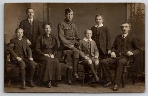 RPPC Family Photo Soldier Dapper Father And Sons Sweet Mother Postcard Q24