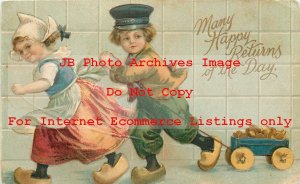 Ellen Clapsaddle, IAP nº 851, crianças holandesas puxando uma carroça pequena-