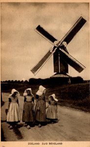 Zeeland, Netherlands - Young Girls walking by the Windmill - c1920