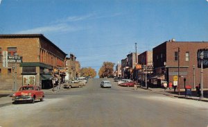 Elm Avenue Cars Drug Store Munising Michigan 1950s postcard