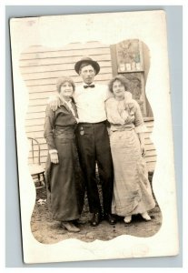 Vintage 1912 RPPC Postcard Photo of Man and Two Woman in Front of House