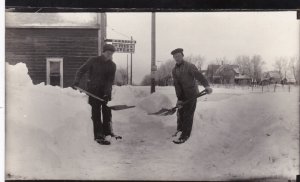 Iowa South Bend A Brand Feed & Livery Men Shoveling Snow Real Photo