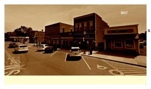 North Amherst OH~Main St~Jackson House~Tinner E S Smith Hardware~RPPC 1909 DPO 