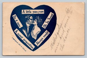 c1907 Man Kisses Women in Blue Heart Sweet Proposition ANTIQUE Postcard 1105
