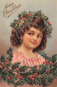 MERRY CHRISTMAS HOLIDAY CHILD / GIRL EMBOSSED POSTCARD (c.1910)