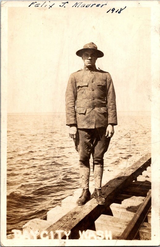 RPPC WWI Soldier Standing on Rail Bridge, Bay City WA c1918 Vintage Postcard M42