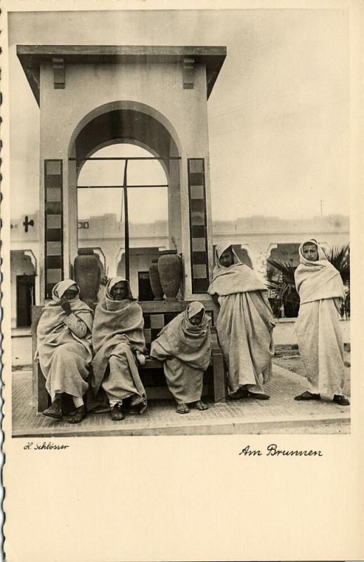 libya, Native Arab Men at the Fountain (1940s) H. Schlösser Photo