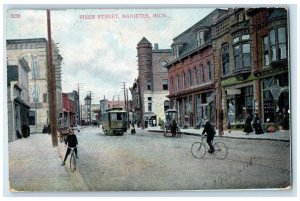 1907 River Street Trolley Carriage Bicycle Building Manistee MI Posted Postcard 